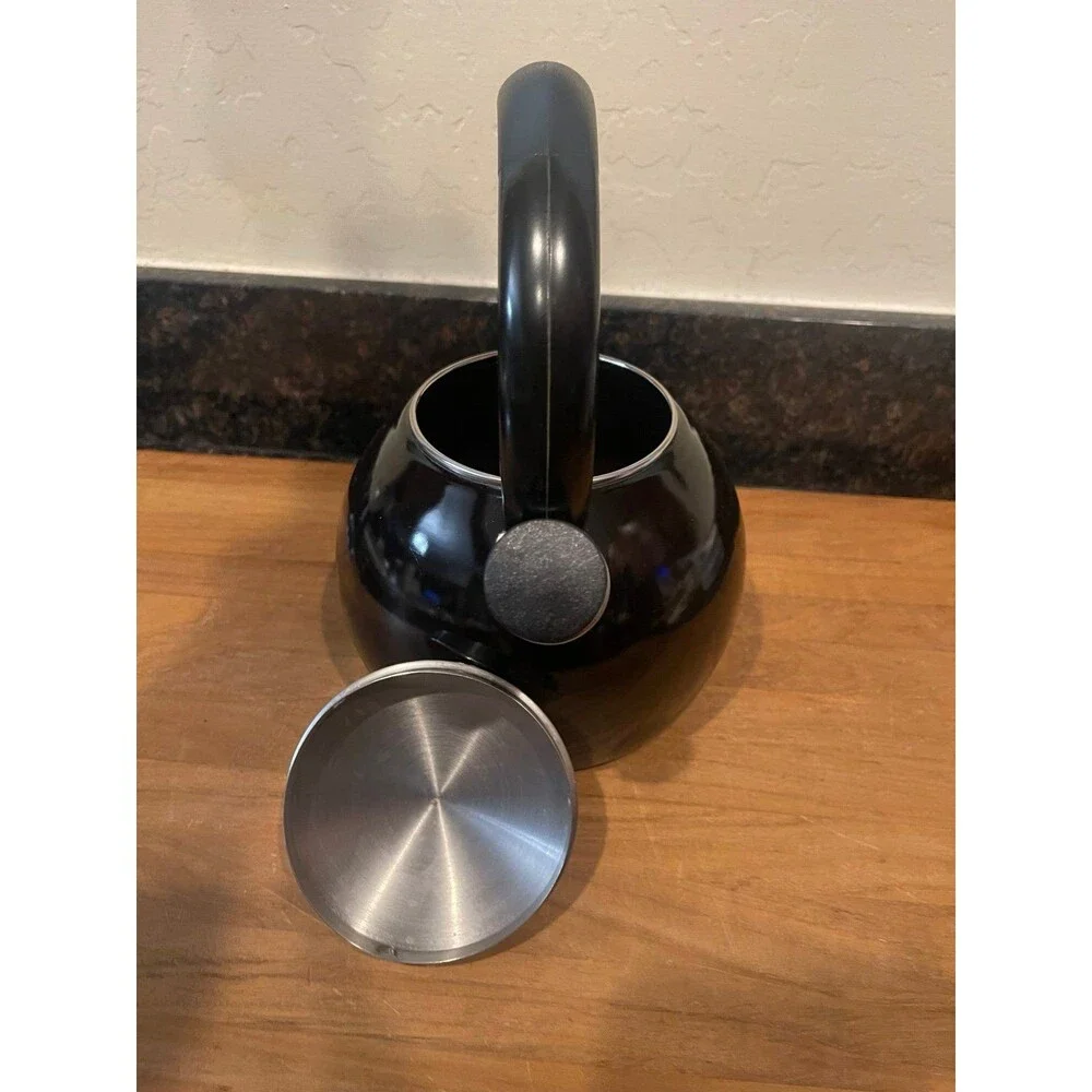 Copco black enameled tea pot with whistler
